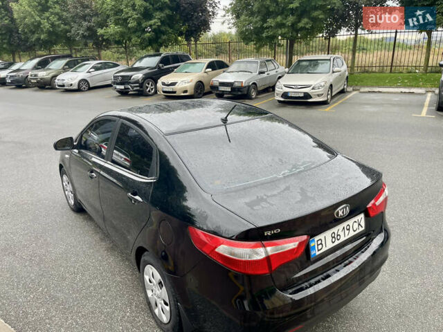Чорний Кіа Ріо, об'ємом двигуна 1.4 л та пробігом 136 тис. км за 7950 $, фото 14 на Automoto.ua