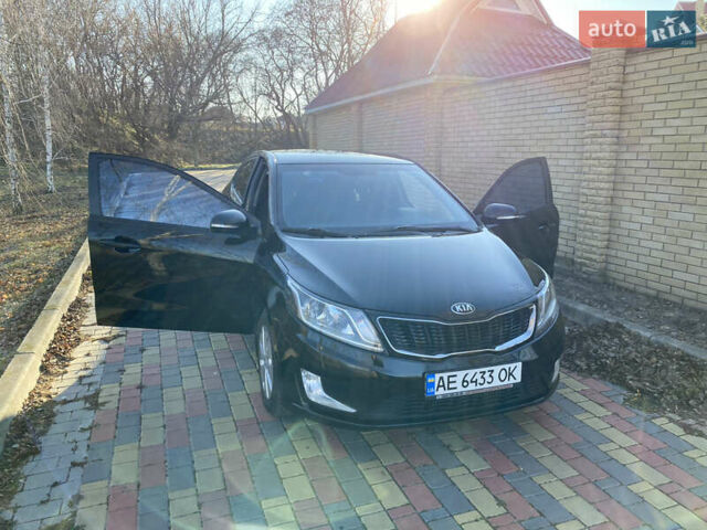 Черный Киа Рио, объемом двигателя 1.6 л и пробегом 170 тыс. км за 8600 $, фото 6 на Automoto.ua