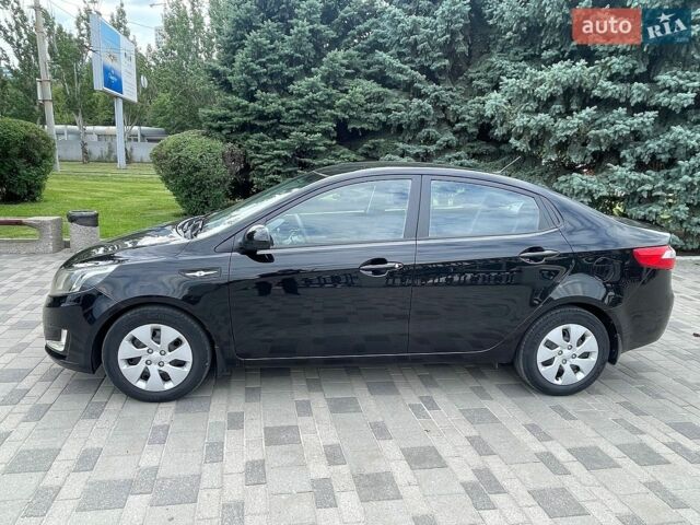 Черный Киа Рио, объемом двигателя 1.4 л и пробегом 89 тыс. км за 8300 $, фото 1 на Automoto.ua