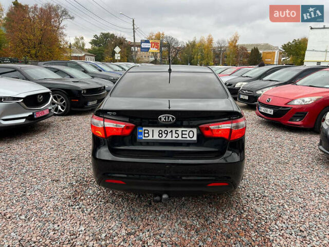 Черный Киа Рио, объемом двигателя 1.6 л и пробегом 170 тыс. км за 7999 $, фото 5 на Automoto.ua