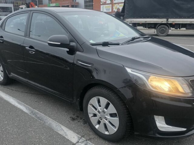 Черный Киа Рио, объемом двигателя 1.6 л и пробегом 150 тыс. км за 9000 $, фото 9 на Automoto.ua