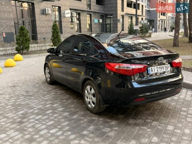 Чорний Кіа Ріо, об'ємом двигуна 1.6 л та пробігом 272 тис. км за 5950 $, фото 8 на Automoto.ua