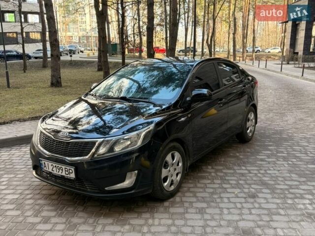 Чорний Кіа Ріо, об'ємом двигуна 1.6 л та пробігом 272 тис. км за 5950 $, фото 1 на Automoto.ua