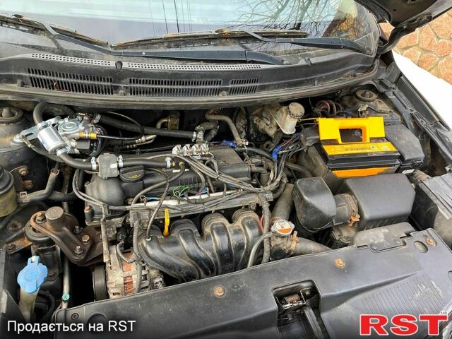 Чорний Кіа Ріо, об'ємом двигуна 1.6 л та пробігом 320 тис. км за 6500 $, фото 2 на Automoto.ua