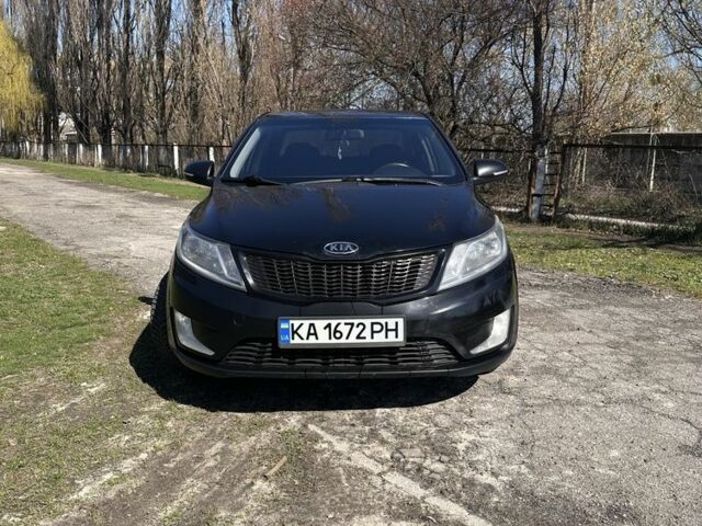 Чорний Кіа Ріо, об'ємом двигуна 1.6 л та пробігом 329 тис. км за 6000 $, фото 1 на Automoto.ua