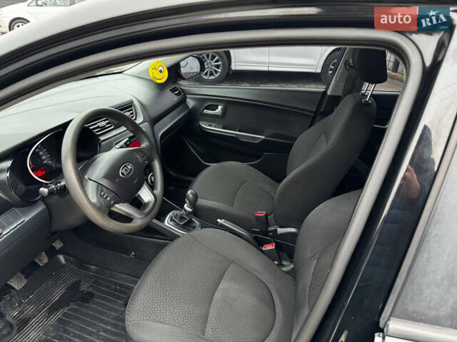 Черный Киа Рио, объемом двигателя 1.4 л и пробегом 185 тыс. км за 6999 $, фото 8 на Automoto.ua