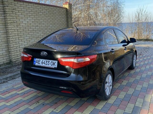 Чорний Кіа Ріо, об'ємом двигуна 1.6 л та пробігом 170 тис. км за 8600 $, фото 2 на Automoto.ua