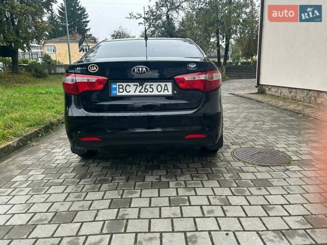 Чорний Кіа Ріо, об'ємом двигуна 1.4 л та пробігом 141 тис. км за 7200 $, фото 6 на Automoto.ua