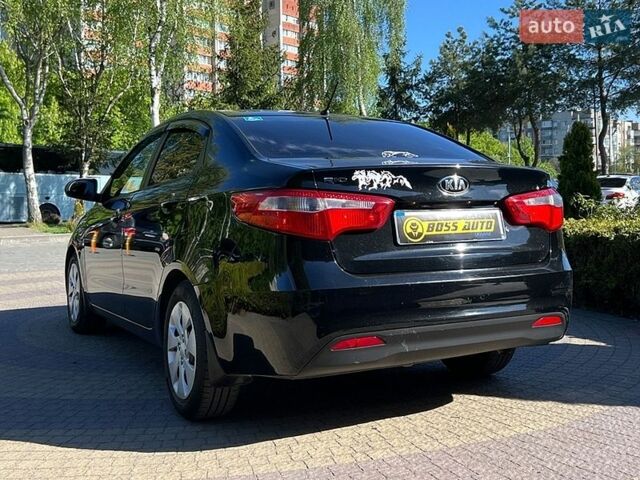 Черный Киа Рио, объемом двигателя 1.4 л и пробегом 215 тыс. км за 6999 $, фото 4 на Automoto.ua