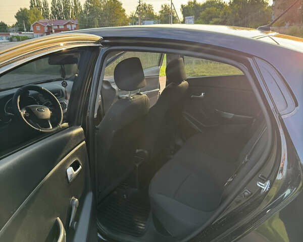 Черный Киа Рио, объемом двигателя 1.4 л и пробегом 183 тыс. км за 7000 $, фото 12 на Automoto.ua