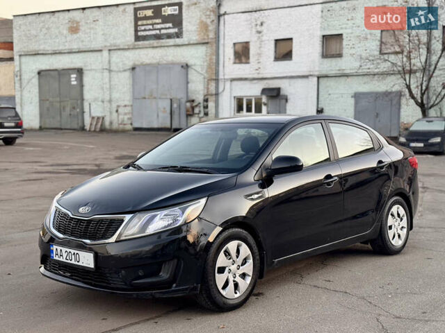 Черный Киа Рио, объемом двигателя 1.4 л и пробегом 305 тыс. км за 4950 $, фото 1 на Automoto.ua