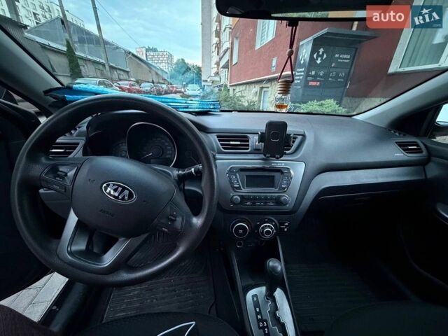 Чорний Кіа Ріо, об'ємом двигуна 1.4 л та пробігом 87 тис. км за 7700 $, фото 14 на Automoto.ua