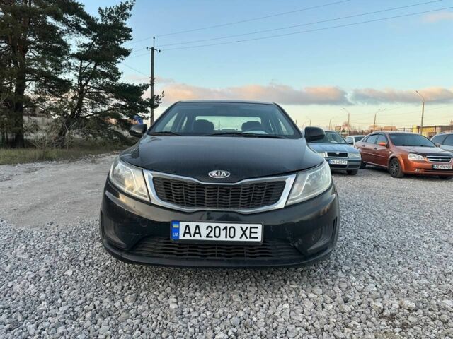 Черный Киа Рио, объемом двигателя 1.4 л и пробегом 199 тыс. км за 5500 $, фото 1 на Automoto.ua