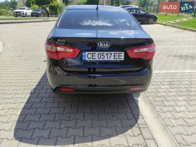 Чорний Кіа Ріо, об'ємом двигуна 1.4 л та пробігом 186 тис. км за 6800 $, фото 1 на Automoto.ua