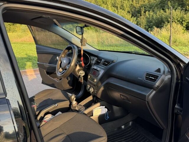 Черный Киа Рио, объемом двигателя 1.4 л и пробегом 185 тыс. км за 5777 $, фото 7 на Automoto.ua