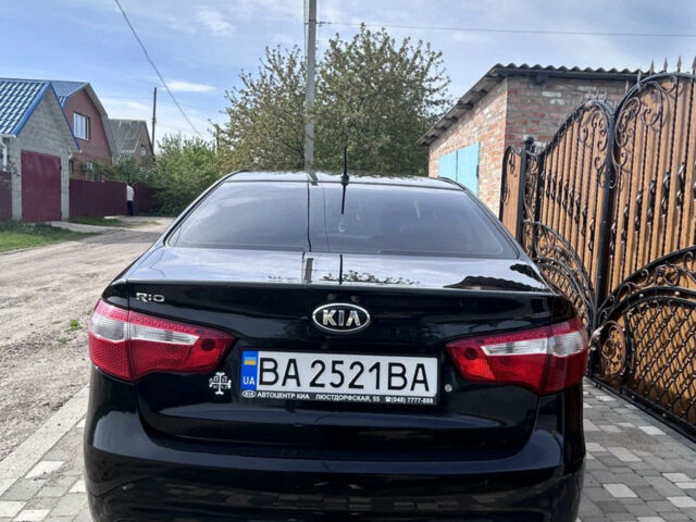Чорний Кіа Ріо, об'ємом двигуна 1.4 л та пробігом 86 тис. км за 7400 $, фото 3 на Automoto.ua