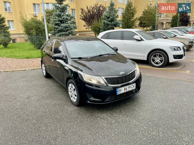 Чорний Кіа Ріо, об'ємом двигуна 1.4 л та пробігом 136 тис. км за 7950 $, фото 19 на Automoto.ua