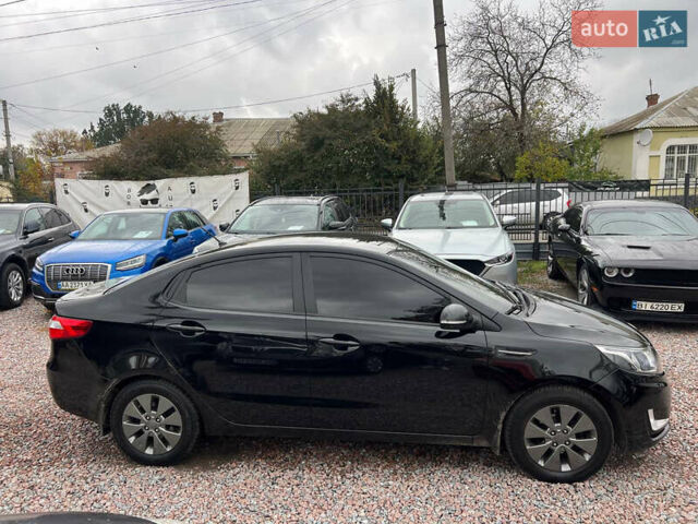 Черный Киа Рио, объемом двигателя 1.6 л и пробегом 170 тыс. км за 7999 $, фото 3 на Automoto.ua