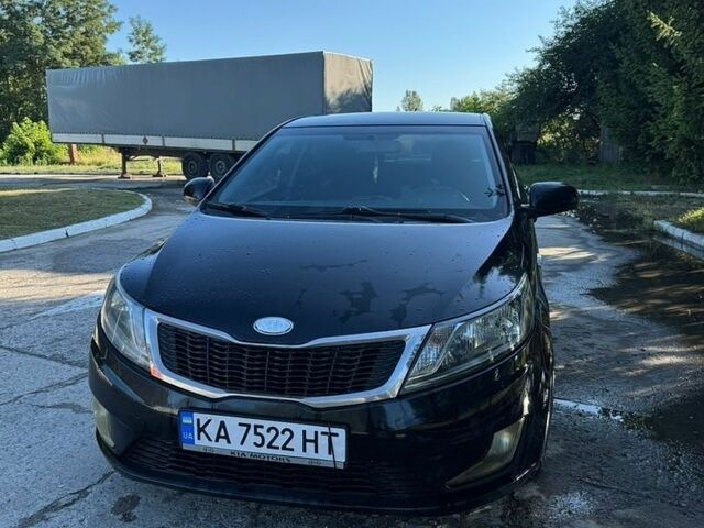 Чорний Кіа Ріо, об'ємом двигуна 1.4 л та пробігом 179 тис. км за 8000 $, фото 7 на Automoto.ua