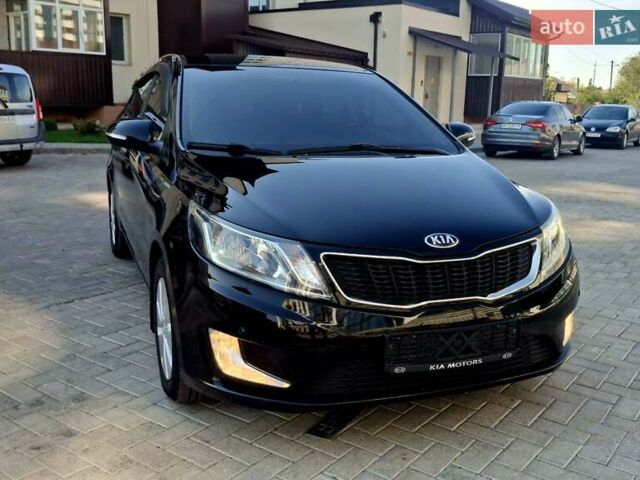 Черный Киа Рио, объемом двигателя 1.6 л и пробегом 130 тыс. км за 8750 $, фото 4 на Automoto.ua