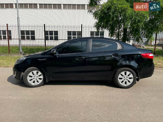 Чорний Кіа Ріо, об'ємом двигуна 1.59 л та пробігом 261 тис. км за 8200 $, фото 3 на Automoto.ua
