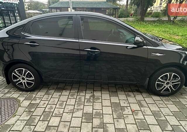 Чорний Кіа Ріо, об'ємом двигуна 1.4 л та пробігом 141 тис. км за 7200 $, фото 1 на Automoto.ua