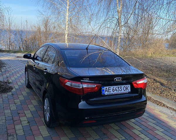 Черный Киа Рио, объемом двигателя 1.6 л и пробегом 170 тыс. км за 8600 $, фото 3 на Automoto.ua