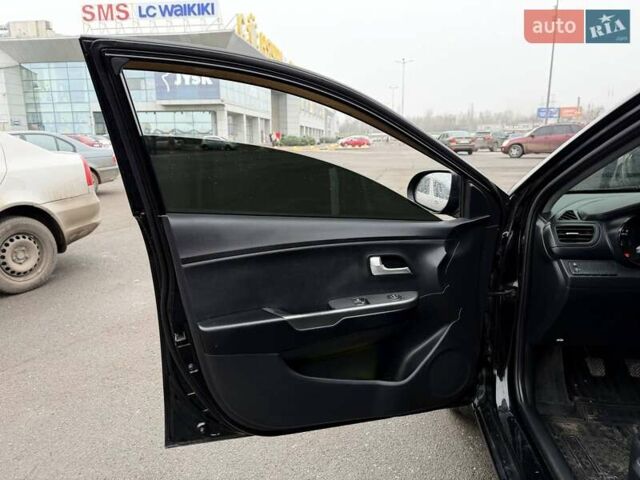Черный Киа Рио, объемом двигателя 1.4 л и пробегом 220 тыс. км за 8200 $, фото 29 на Automoto.ua