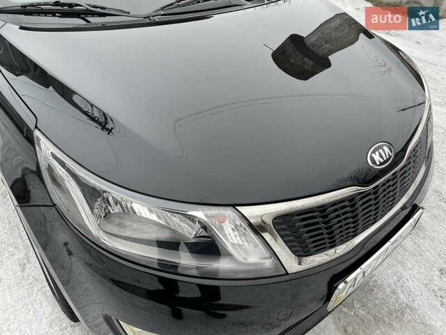 Черный Киа Рио, объемом двигателя 1.4 л и пробегом 124 тыс. км за 9350 $, фото 40 на Automoto.ua