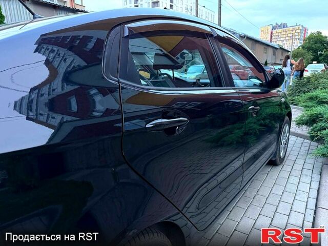 Чорний Кіа Ріо, об'ємом двигуна 1.4 л та пробігом 87 тис. км за 7700 $, фото 7 на Automoto.ua