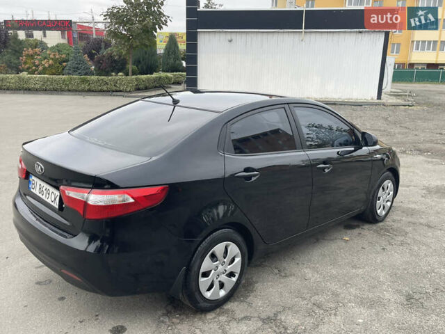 Черный Киа Рио, объемом двигателя 1.4 л и пробегом 136 тыс. км за 7700 $, фото 10 на Automoto.ua