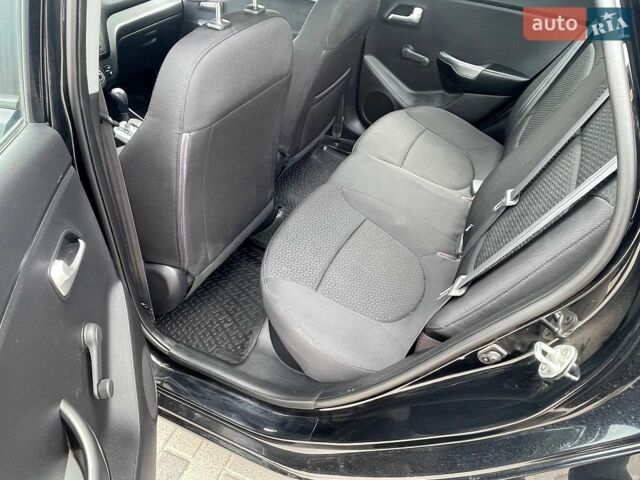 Черный Киа Рио, объемом двигателя 1.4 л и пробегом 89 тыс. км за 8300 $, фото 16 на Automoto.ua