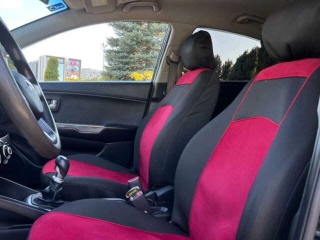 Черный Киа Рио, объемом двигателя 1.4 л и пробегом 215 тыс. км за 6999 $, фото 8 на Automoto.ua