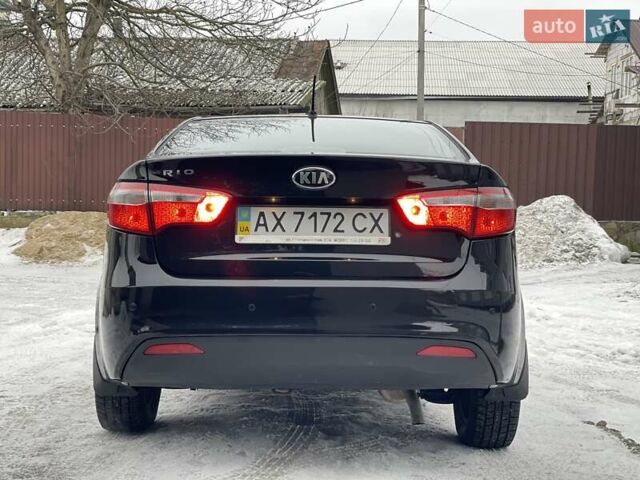 Черный Киа Рио, объемом двигателя 1.4 л и пробегом 124 тыс. км за 9350 $, фото 14 на Automoto.ua
