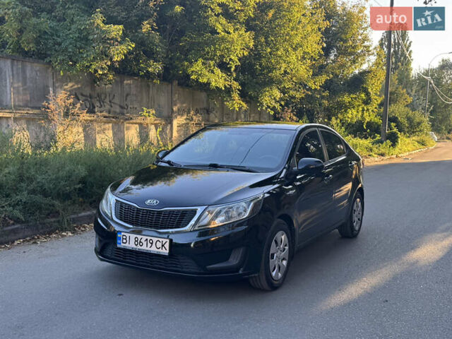 Черный Киа Рио, объемом двигателя 1.4 л и пробегом 135 тыс. км за 8000 $, фото 4 на Automoto.ua