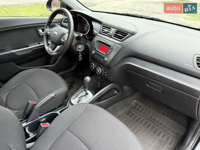 Чорний Кіа Ріо, об'ємом двигуна 1.4 л та пробігом 45 тис. км за 9800 $, фото 23 на Automoto.ua