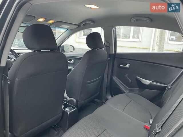 Черный Киа Рио, объемом двигателя 1.4 л и пробегом 124 тыс. км за 9350 $, фото 131 на Automoto.ua