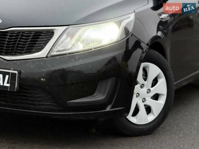 Черный Киа Рио, объемом двигателя 1.4 л и пробегом 220 тыс. км за 8200 $, фото 2 на Automoto.ua