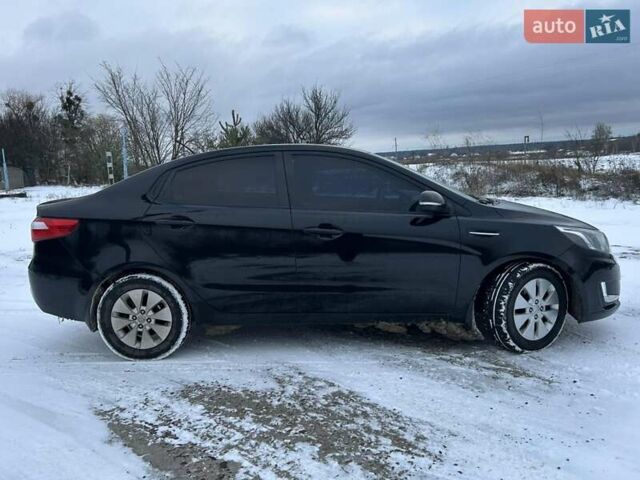 Черный Киа Рио, объемом двигателя 1.59 л и пробегом 107 тыс. км за 7950 $, фото 1 на Automoto.ua