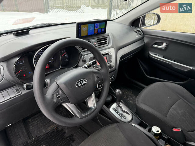 Чорний Кіа Ріо, об'ємом двигуна 1.4 л та пробігом 123 тис. км за 7300 $, фото 6 на Automoto.ua