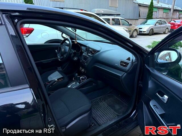 Чорний Кіа Ріо, об'ємом двигуна 1.4 л та пробігом 87 тис. км за 7700 $, фото 8 на Automoto.ua