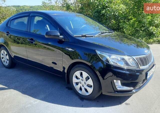 Черный Киа Рио, объемом двигателя 1.4 л и пробегом 121 тыс. км за 8600 $, фото 3 на Automoto.ua