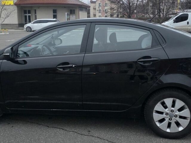 Черный Киа Рио, объемом двигателя 1.6 л и пробегом 150 тыс. км за 9000 $, фото 4 на Automoto.ua