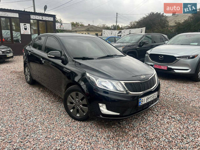 Черный Киа Рио, объемом двигателя 1.6 л и пробегом 170 тыс. км за 7999 $, фото 2 на Automoto.ua