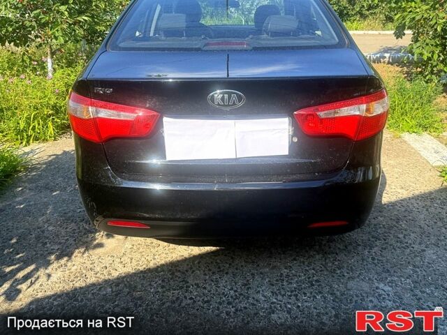 Черный Киа Рио, объемом двигателя 1.4 л и пробегом 109 тыс. км за 8100 $, фото 5 на Automoto.ua