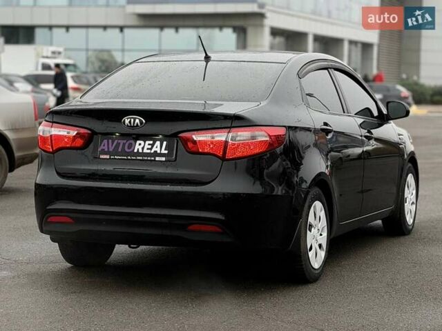 Черный Киа Рио, объемом двигателя 1.4 л и пробегом 220 тыс. км за 8200 $, фото 14 на Automoto.ua