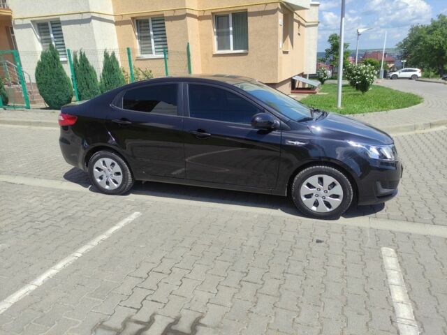 Черный Киа Рио, объемом двигателя 1.4 л и пробегом 186 тыс. км за 6800 $, фото 1 на Automoto.ua