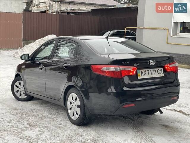 Черный Киа Рио, объемом двигателя 1.4 л и пробегом 124 тыс. км за 9350 $, фото 10 на Automoto.ua