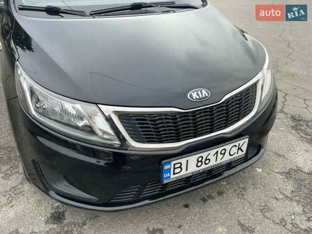 Черный Киа Рио, объемом двигателя 1.4 л и пробегом 136 тыс. км за 7700 $, фото 16 на Automoto.ua