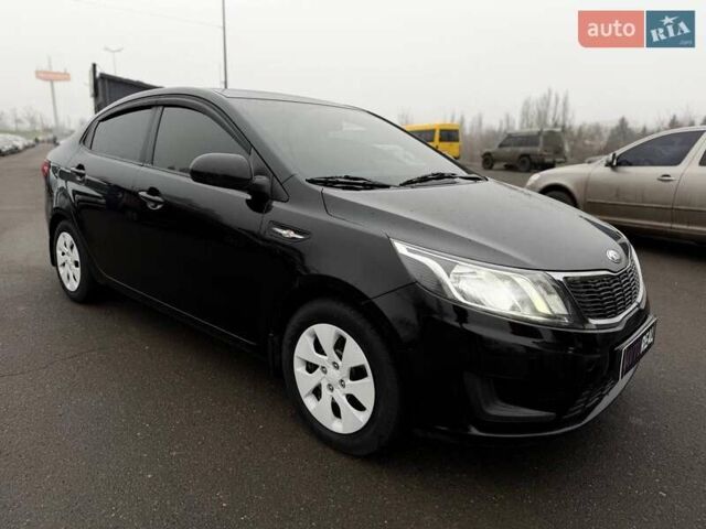 Черный Киа Рио, объемом двигателя 1.4 л и пробегом 220 тыс. км за 8200 $, фото 13 на Automoto.ua